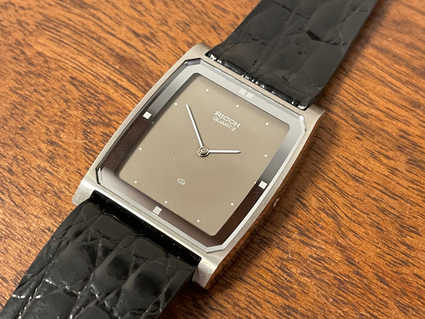 (1970s/1980s) Ricoh 632042 Riquartz "Tank" dress watch - flat taupe dial w/ white markers (NOS)