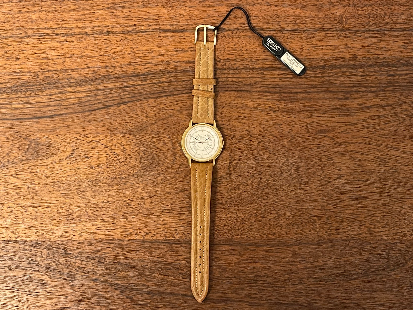 (1989) Seiko 5S21-7A10 Quartz medial pulsation - cream dial w/ gold Arabic numerals (NOS)