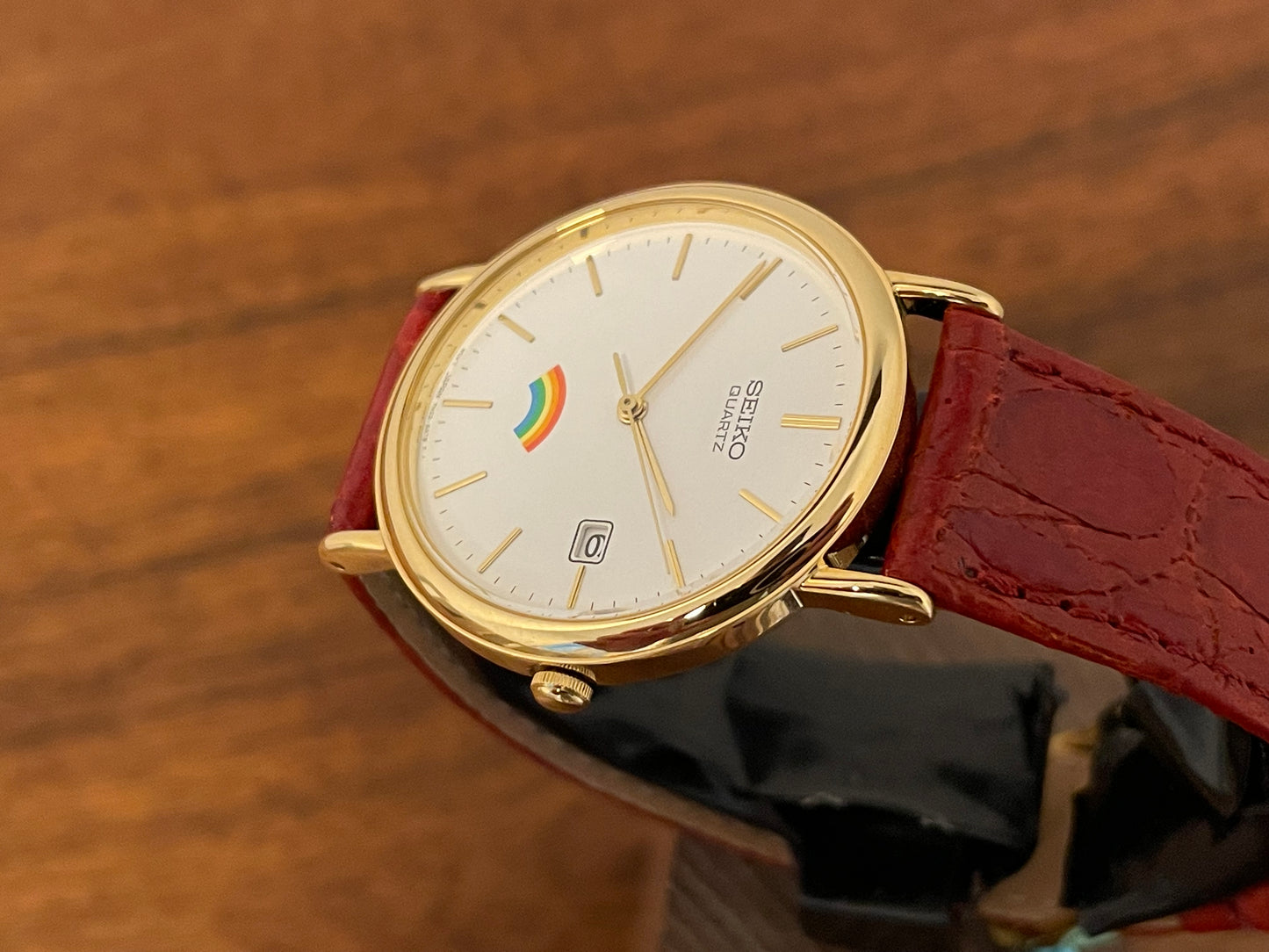(2002) Seiko 7N22-8A00 Quartz "Arcobaleno" dress watch - white dial w/ rainbow logo (NOS)