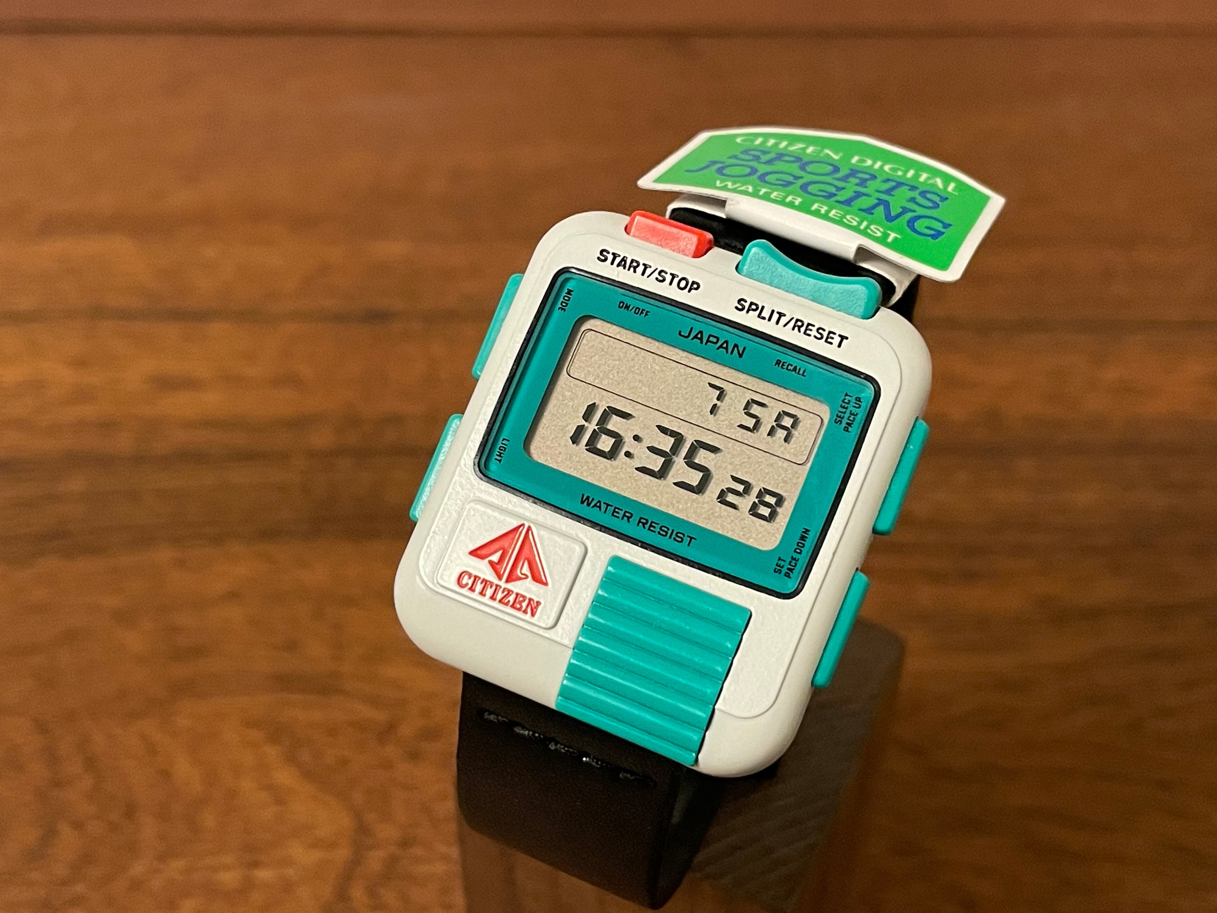1986) Citizen Sports Jogging digital Bullhead D050 white teal