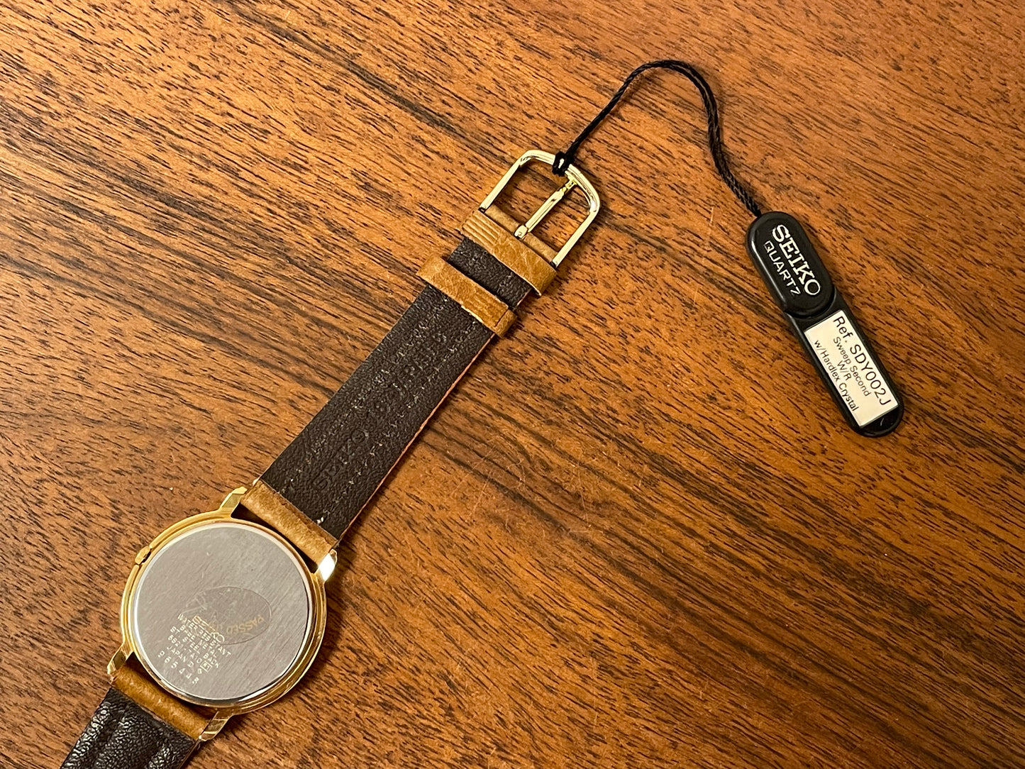 (1989) Seiko 5S21-7A10 Quartz medial pulsation - cream dial w/ gold Arabic numerals (NOS)