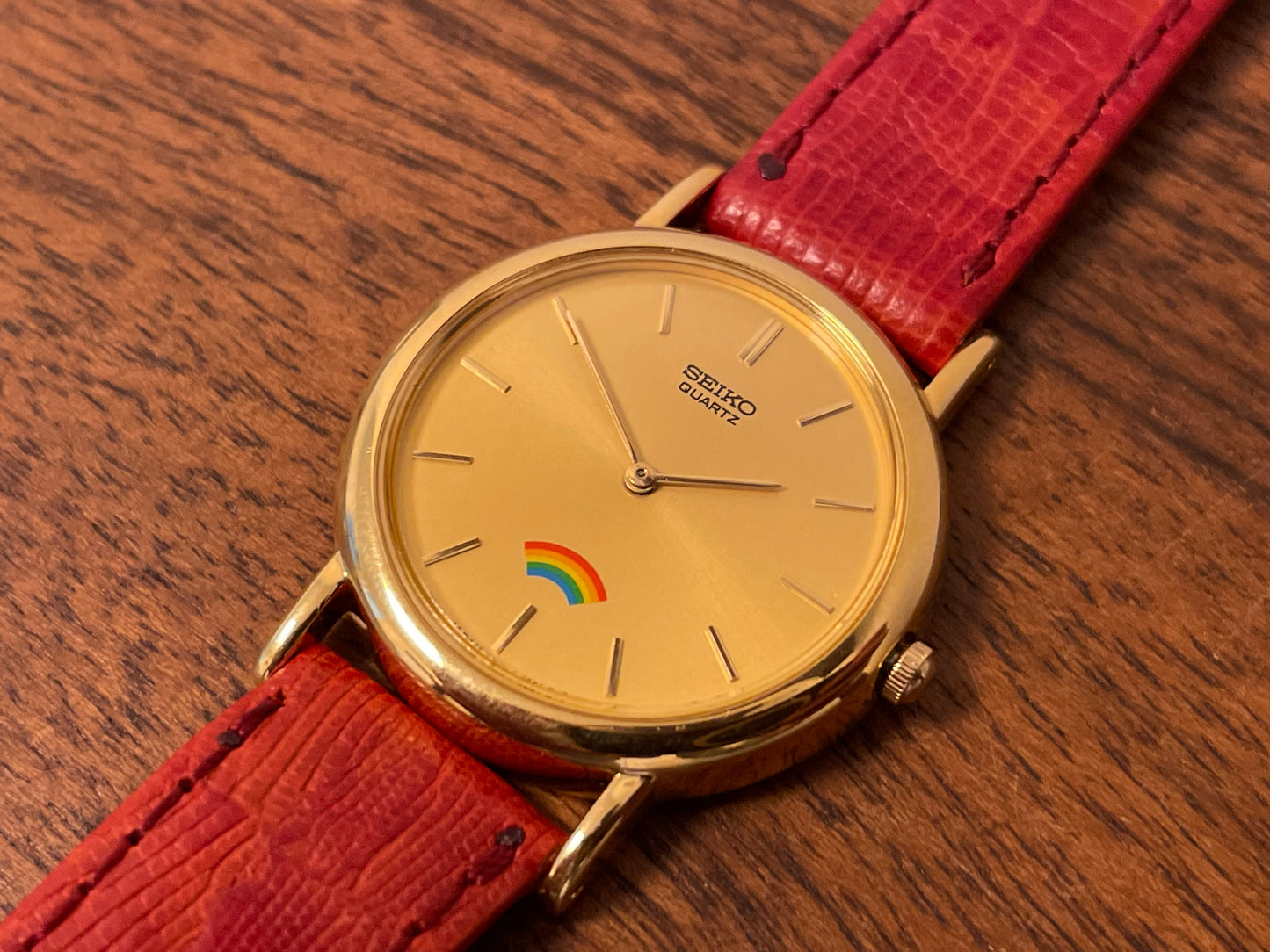 (2002) Seiko 4N00-0711 Quartz "Arcobaleno" dress watch - gold dial w/ rainbow logo - small size (NOS)