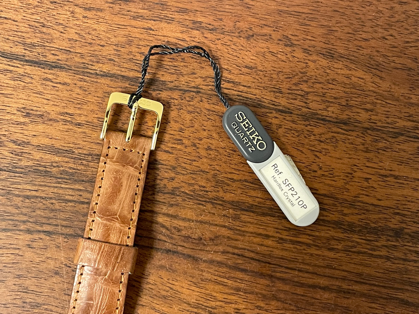 (1992) Seiko 7N00-6A00 dress watch - white dial w/ Roman numerals & Spade hands (NOS)