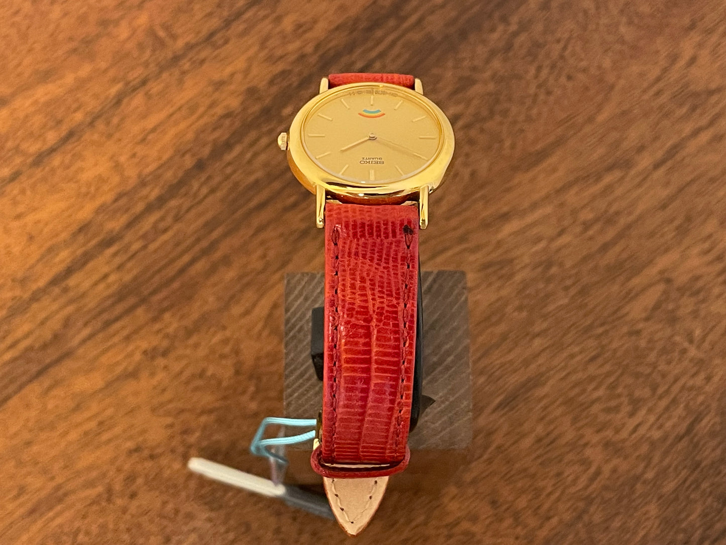 (2002) Seiko 4N00-0711 Quartz "Arcobaleno" dress watch - gold dial w/ rainbow logo - small size (NOS)