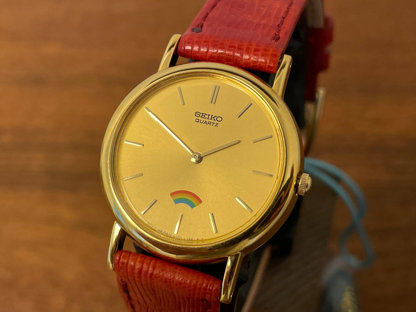 (2002) Seiko 4N00-0711 Quartz "Arcobaleno" dress watch - gold dial w/ rainbow logo - small size (NOS)