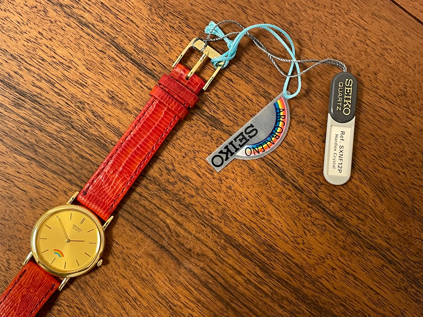 (2002) Seiko 4N00-0711 Quartz "Arcobaleno" dress watch - gold dial w/ rainbow logo - small size (NOS)