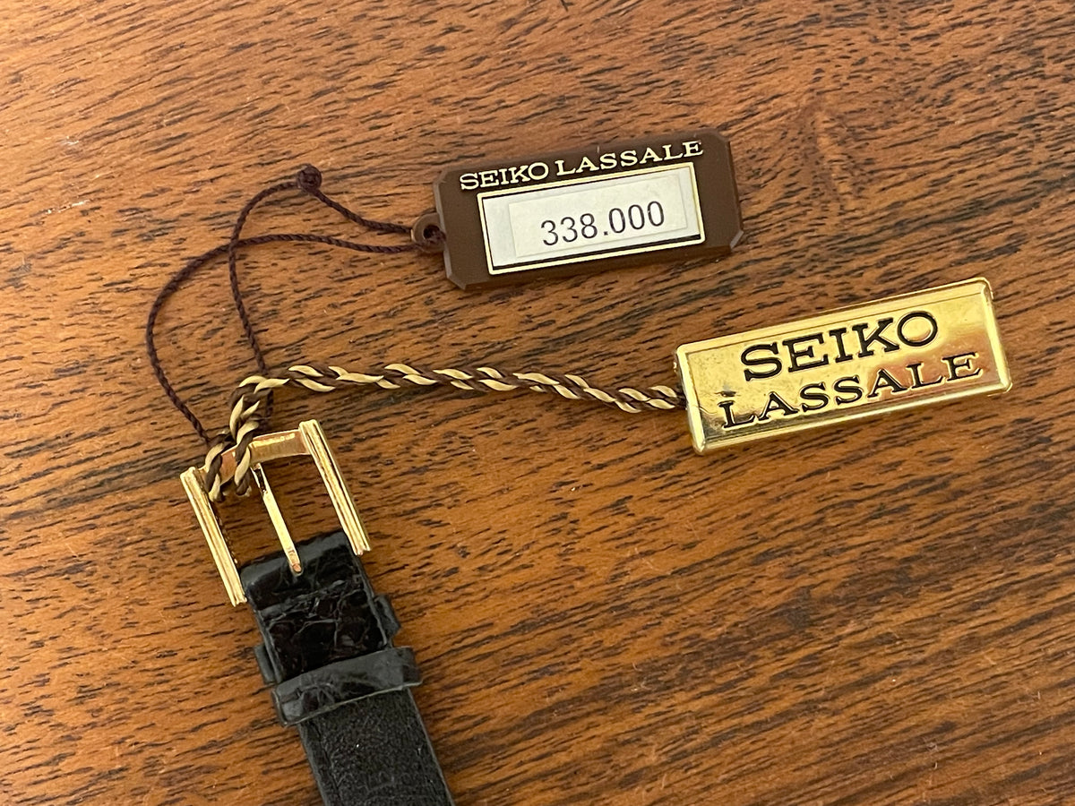 (1980) Seiko 1400-7249 Lassale "Ellipse" dress watch - black dial w/ gold Roman numerals - small size (NOS)