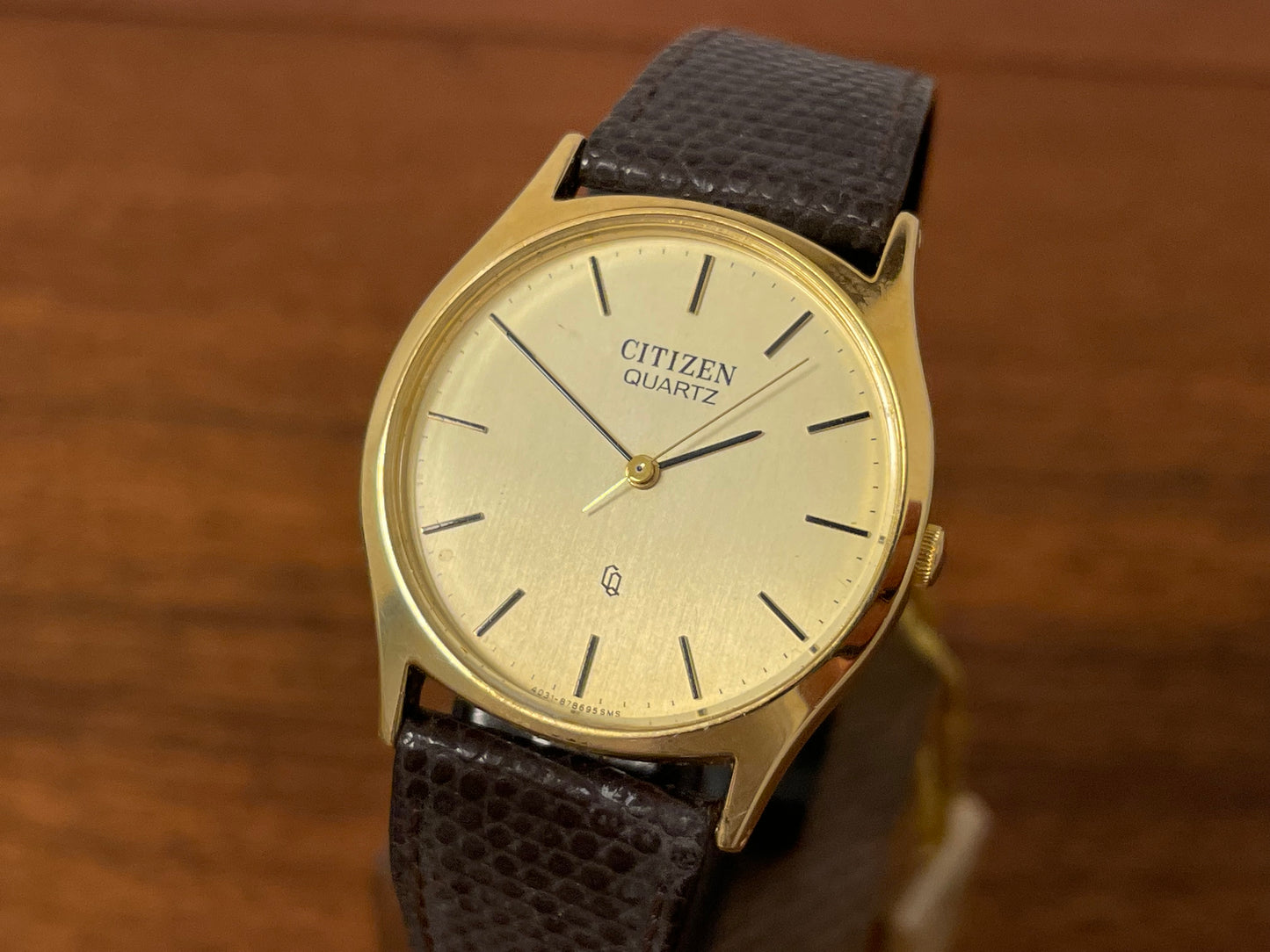 (1987) Citizen 37-9085-82 dress watch - gold colored case w/ champagne dial (NOS)