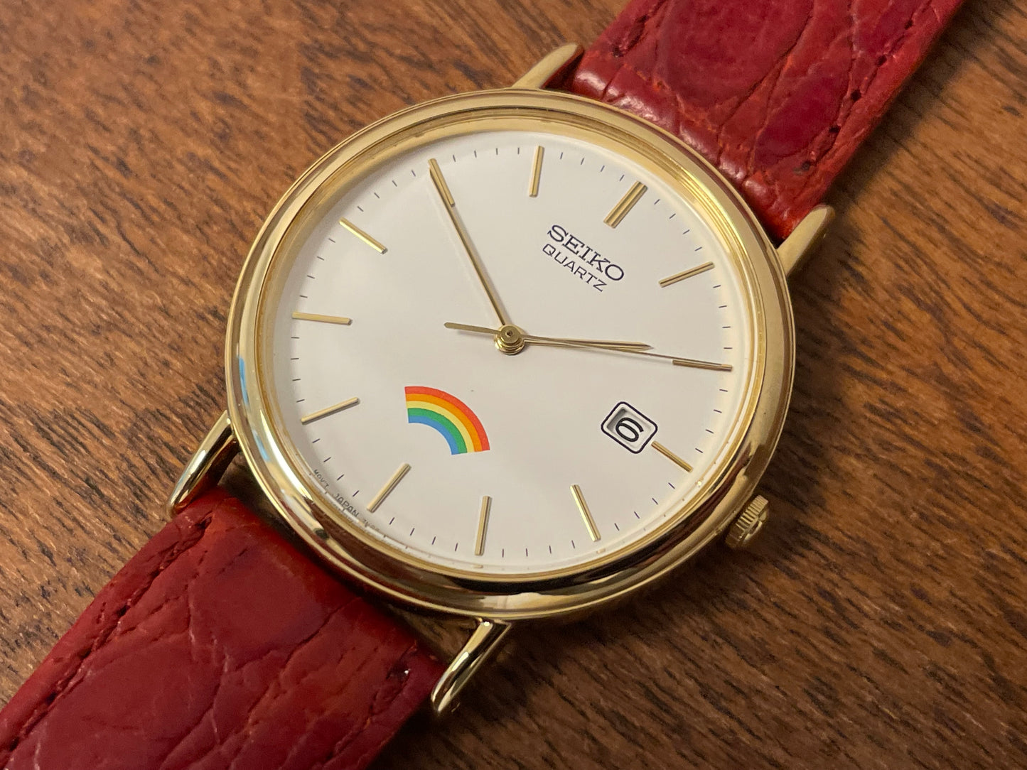 (2002) Seiko 7N22-8A00 Quartz "Arcobaleno" dress watch - white dial w/ rainbow logo (NOS)
