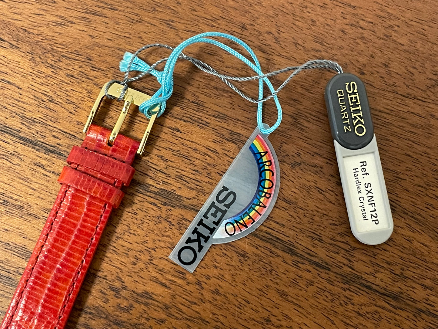 (2002) Seiko 4N00-0711 Quartz "Arcobaleno" dress watch - gold dial w/ rainbow logo - small size (NOS)
