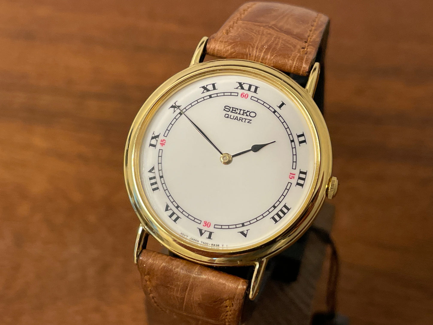 (1992) Seiko 7N00-6A00 dress watch - white dial w/ Roman numerals & Spade hands (NOS)