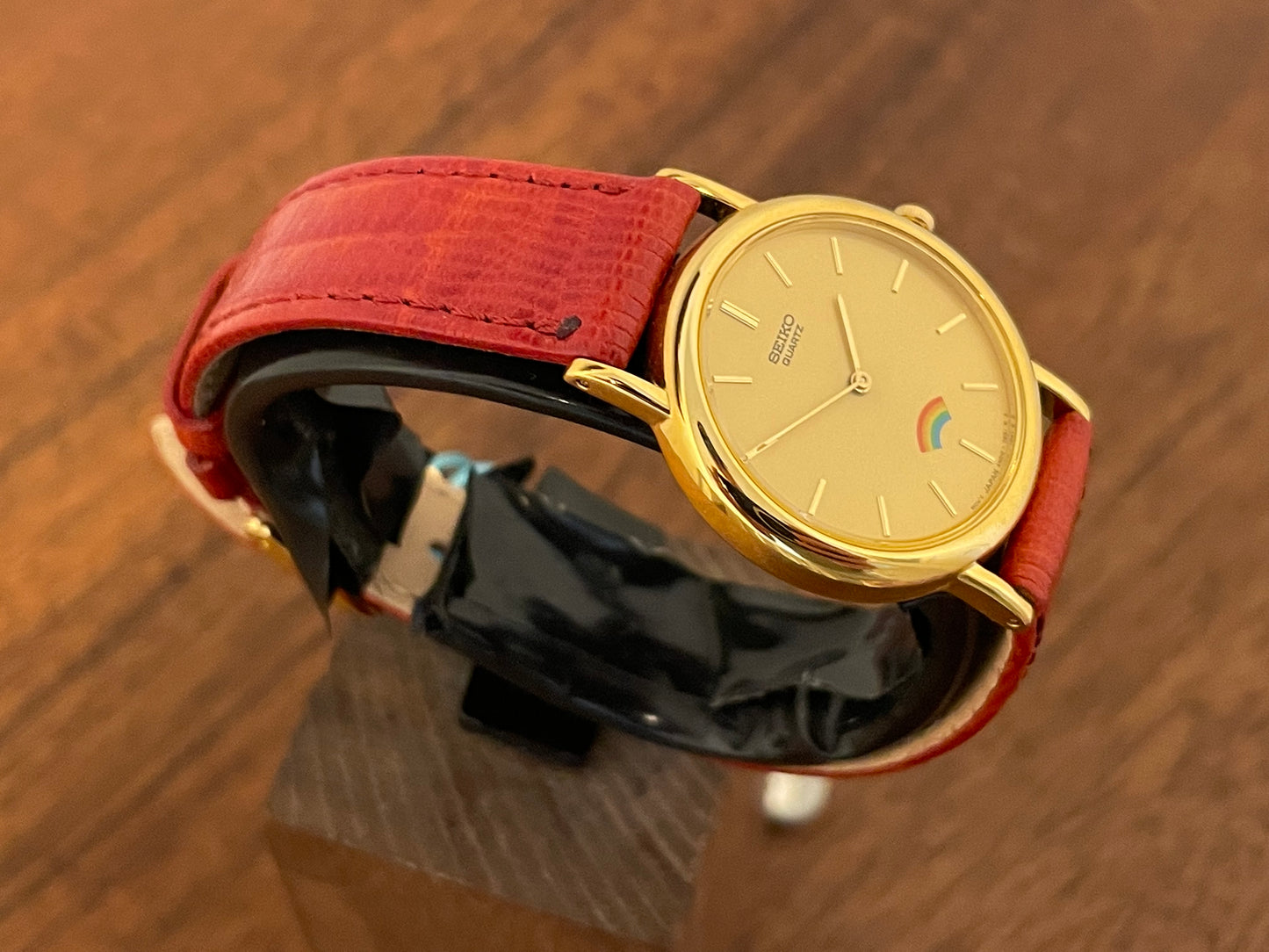 (2002) Seiko 4N00-0711 Quartz "Arcobaleno" dress watch - gold dial w/ rainbow logo - small size (NOS)