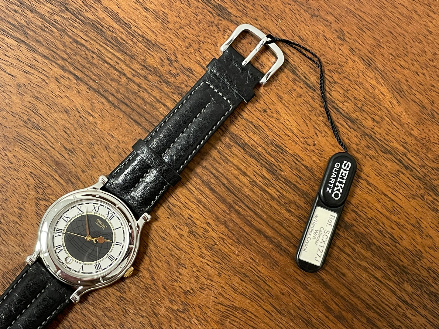 (1990) Seiko 5Y22-6050 Age of Discovery dress watch - dark grey/white bullseye dial with Roman numerals (NOS)