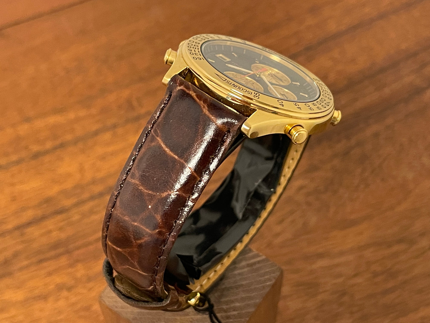(1991) Seiko 7T42-7A4A “John Player Special” chronograph - gold case, black dial w/ gold markers (NOS)