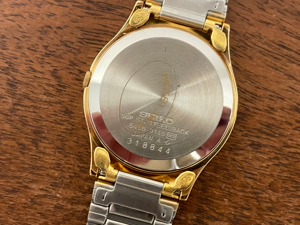 (1983) Seiko 8420-0140 dress watch - gold case - gold sunburst dial w/ gold stick markers (NOS)