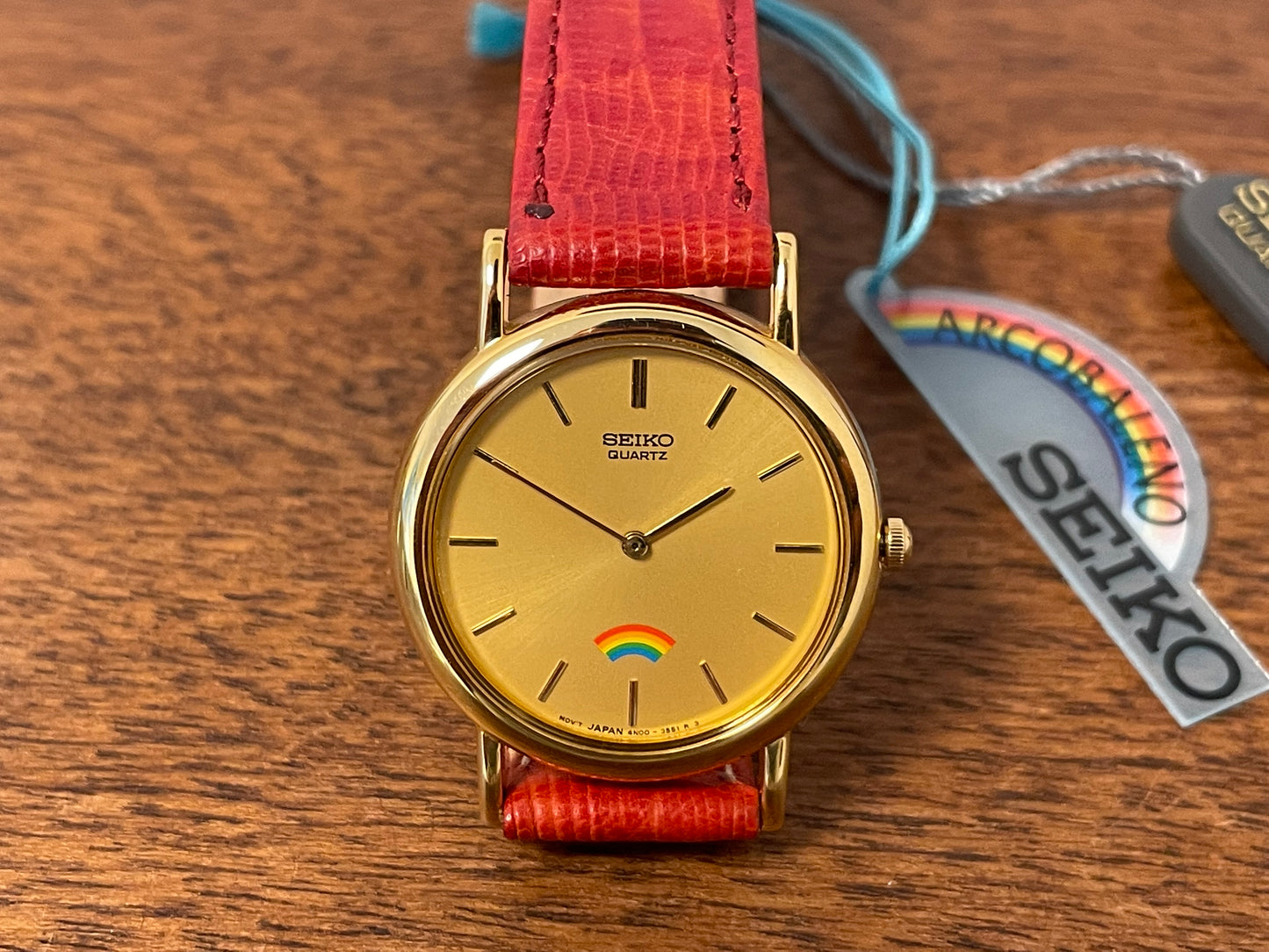 (2002) Seiko 4N00-0711 Quartz "Arcobaleno" dress watch - gold dial w/ rainbow logo - small size (NOS)