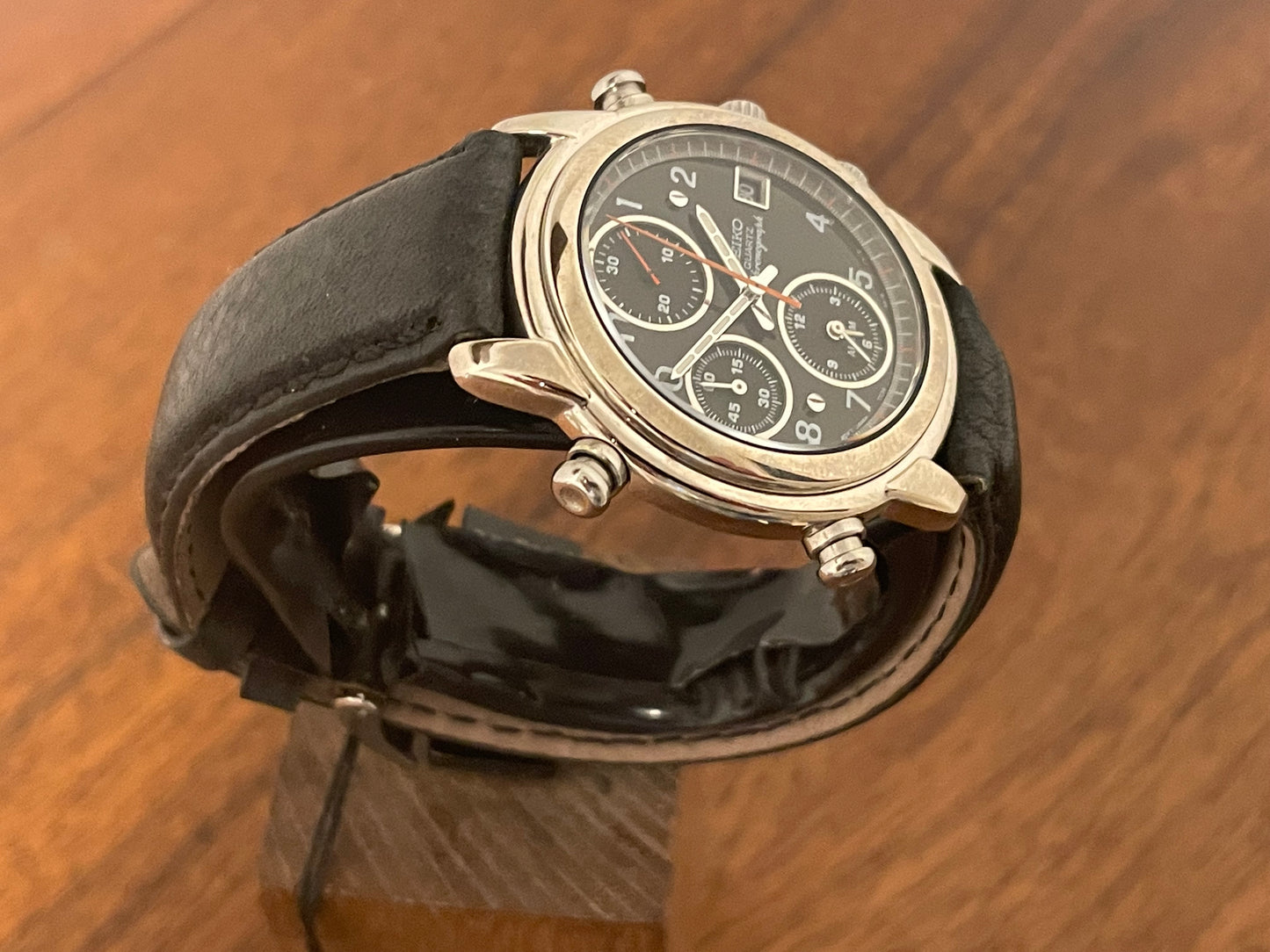 (1992) Seiko 7T32-6D4A Quartz big pusher chronograph - silver case - black dial w/ white Arabic numerals (NOS)