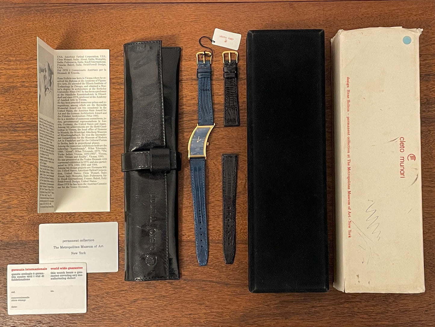 (1991) Cleto Munari "Parentesi" by Hans Hollein - asymmetrical 18K gold electroplated case - blue enamel dial (NOS + full set)