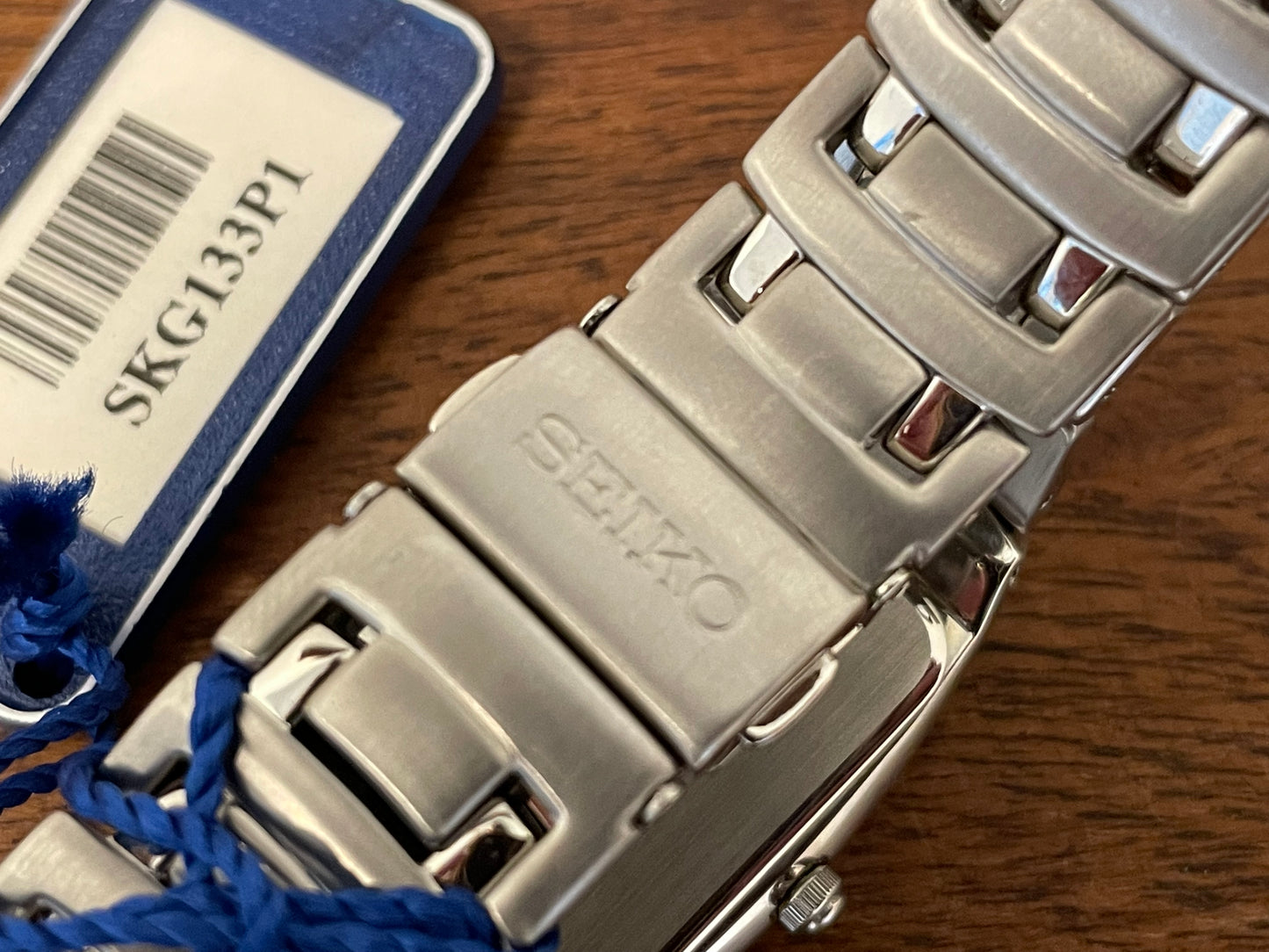 (1999) Seiko V732-5B70 "Tank" - integrated bracelet - blue sunburst dial w/ Roman numerals (NOS)