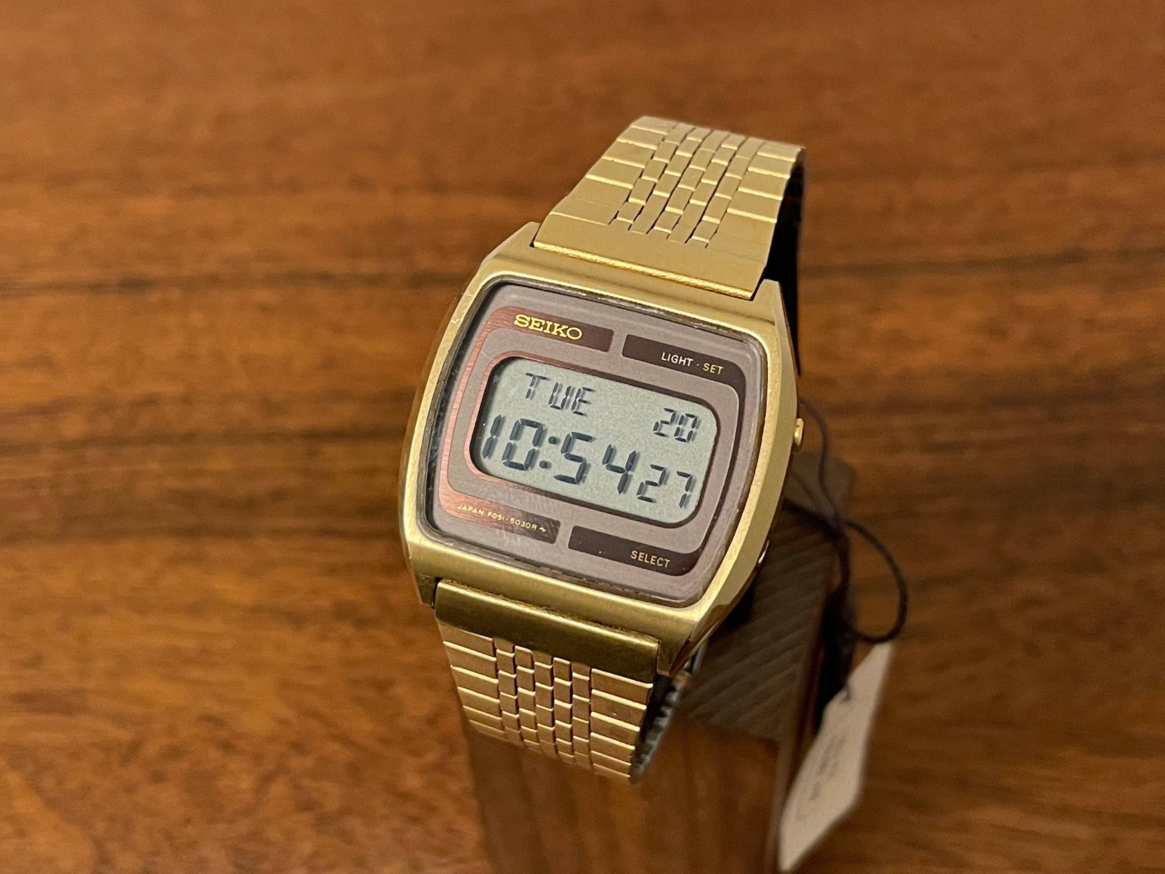 1979) Seiko F051-5030 digital display gold case w/ grey brown