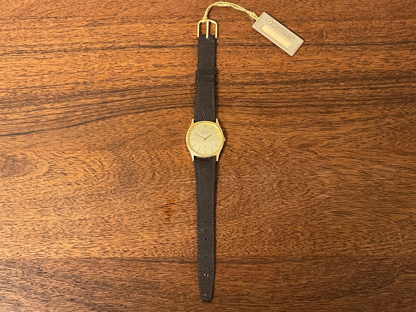 (1987) Citizen 37-9085-82 dress watch - gold colored case w/ champagne dial (NOS)