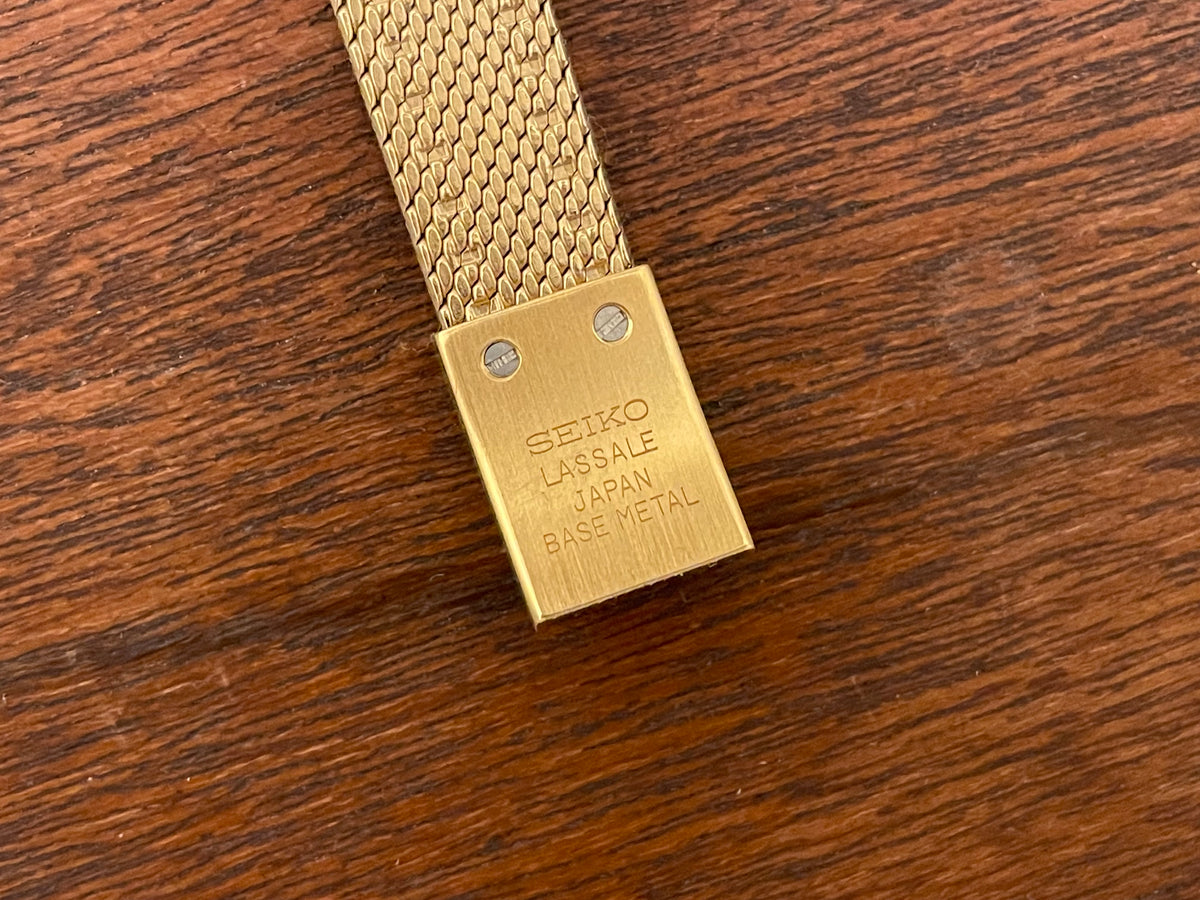 (1981) Seiko 8420-5219 Lassale dress watch - gold integrated bracelet & case - gold dust dial w/ gold stick markers - small size (NOS)