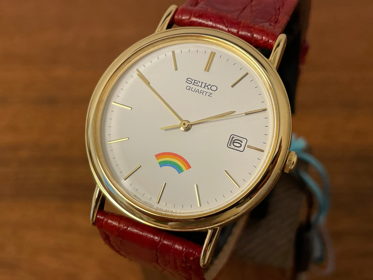 (2002) Seiko 7N22-8A00 Quartz "Arcobaleno" dress watch - white dial w/ rainbow logo (NOS)