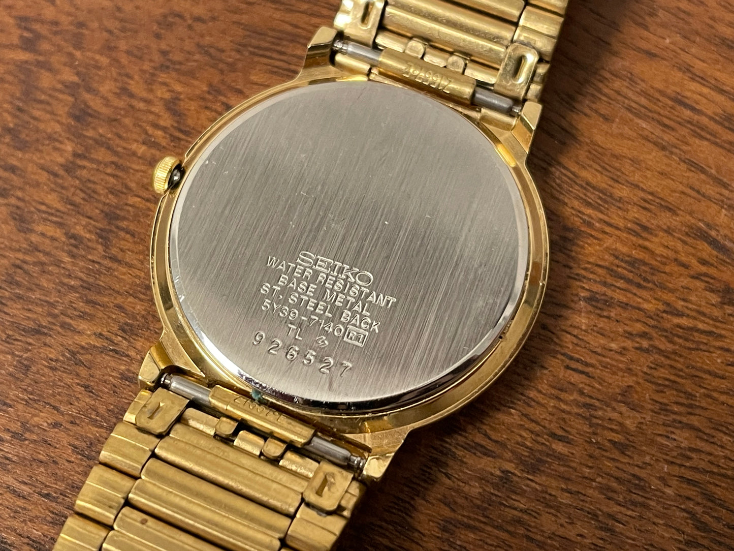 (1992) Seiko 5Y89-7A10 dress watch – white dial w/ Roman numerals & date (NOS)