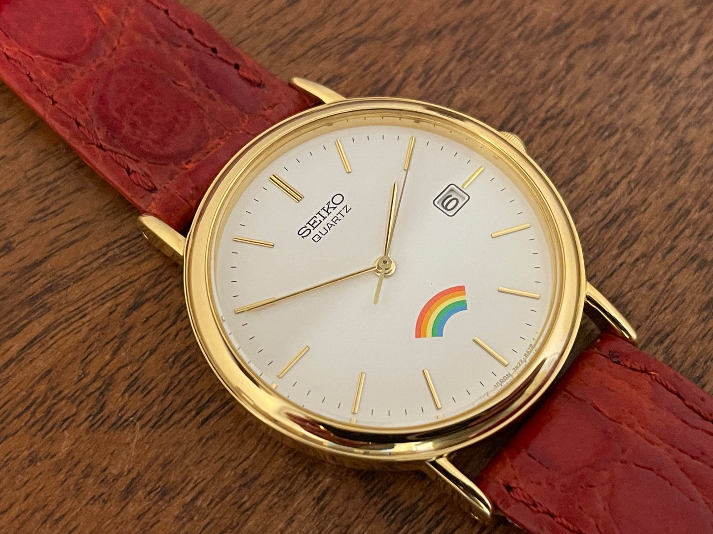 (2002) Seiko 7N22-8A00 Quartz "Arcobaleno" dress watch - white dial w/ rainbow logo (NOS)