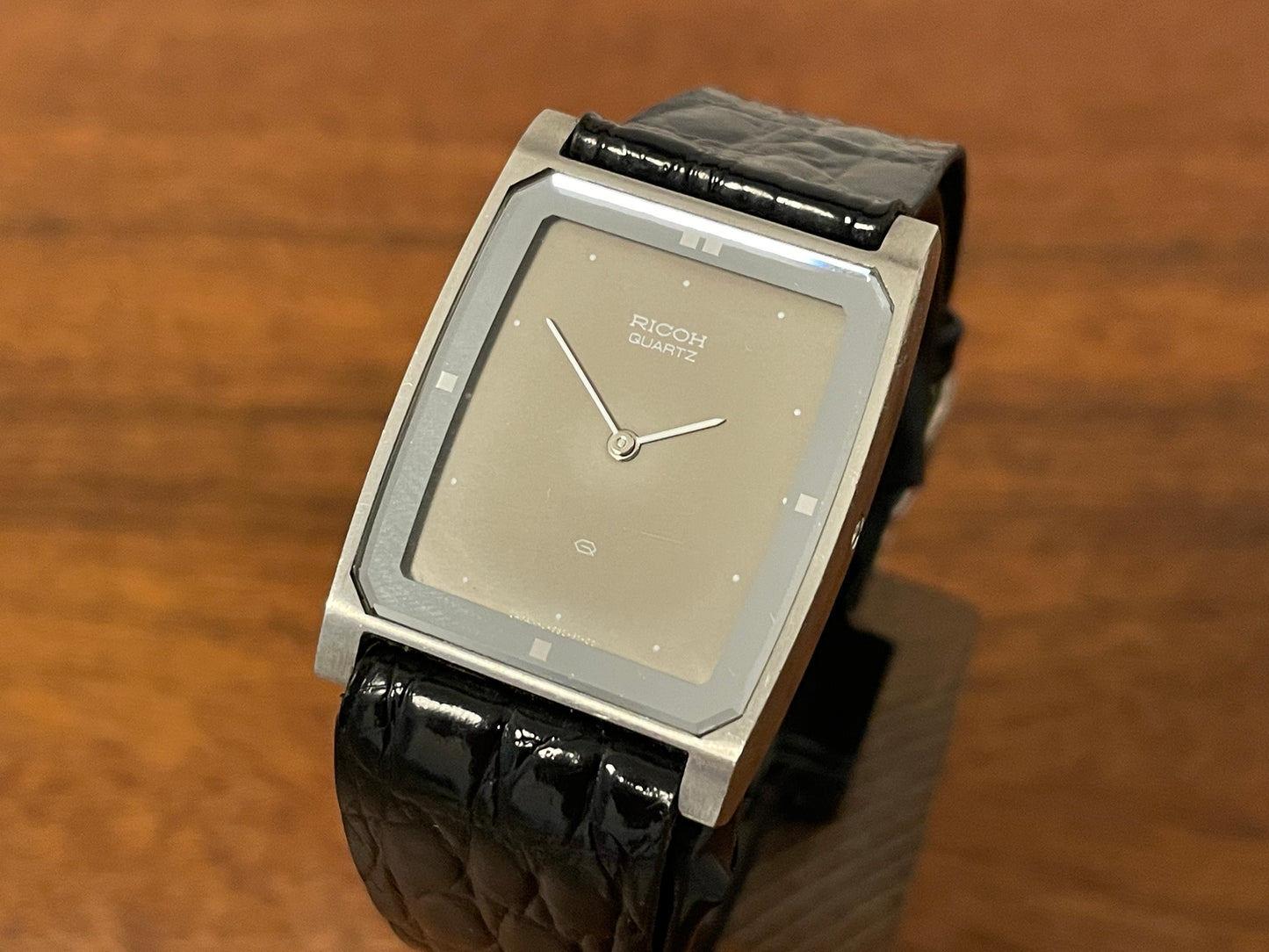 (1970s/1980s) Ricoh 632042 Riquartz "Tank" dress watch - flat taupe dial w/ white markers (NOS)