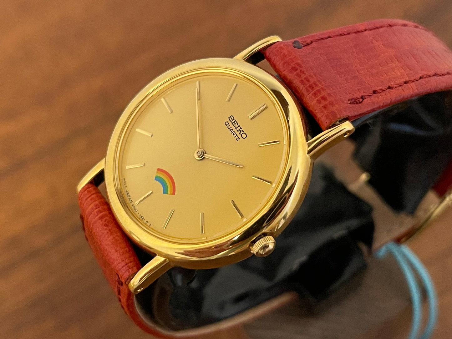(2002) Seiko 4N00-0711 Quartz "Arcobaleno" dress watch - gold dial w/ rainbow logo - small size (NOS)