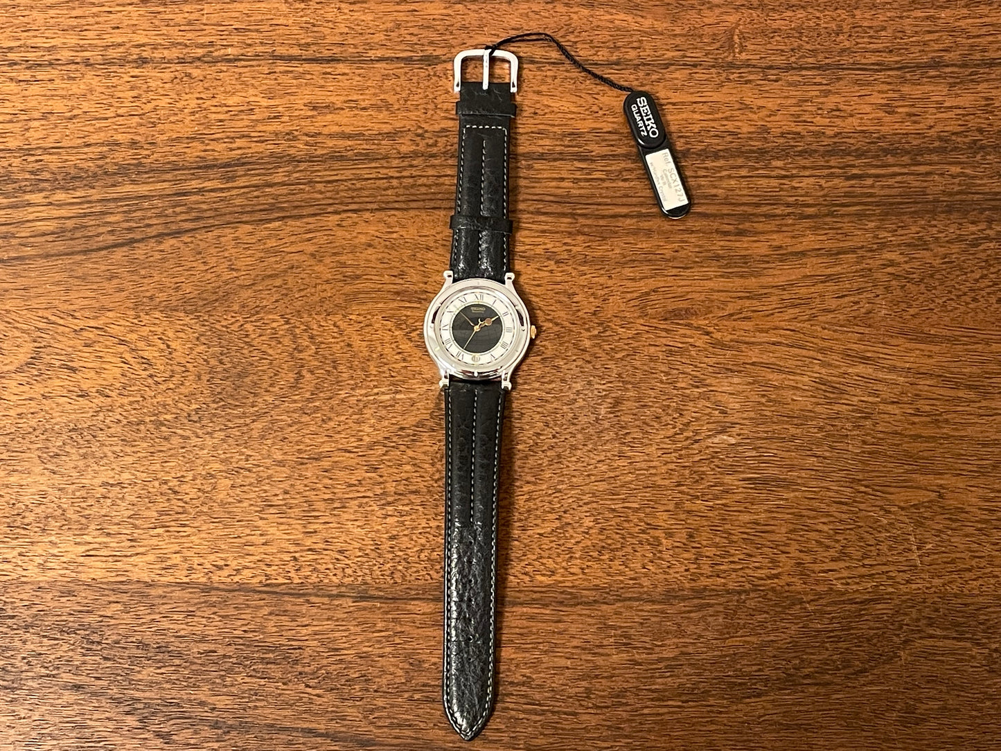 (1990) Seiko 5Y22-6050 Age of Discovery dress watch - dark grey/white bullseye dial with Roman numerals (NOS)