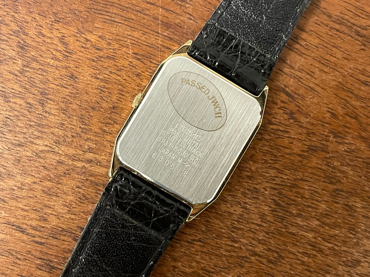 (1986) Seiko 5P31-5030 Quartz "Tank" dress watch - brushed dark grey dial w/ gold markers (NOS)