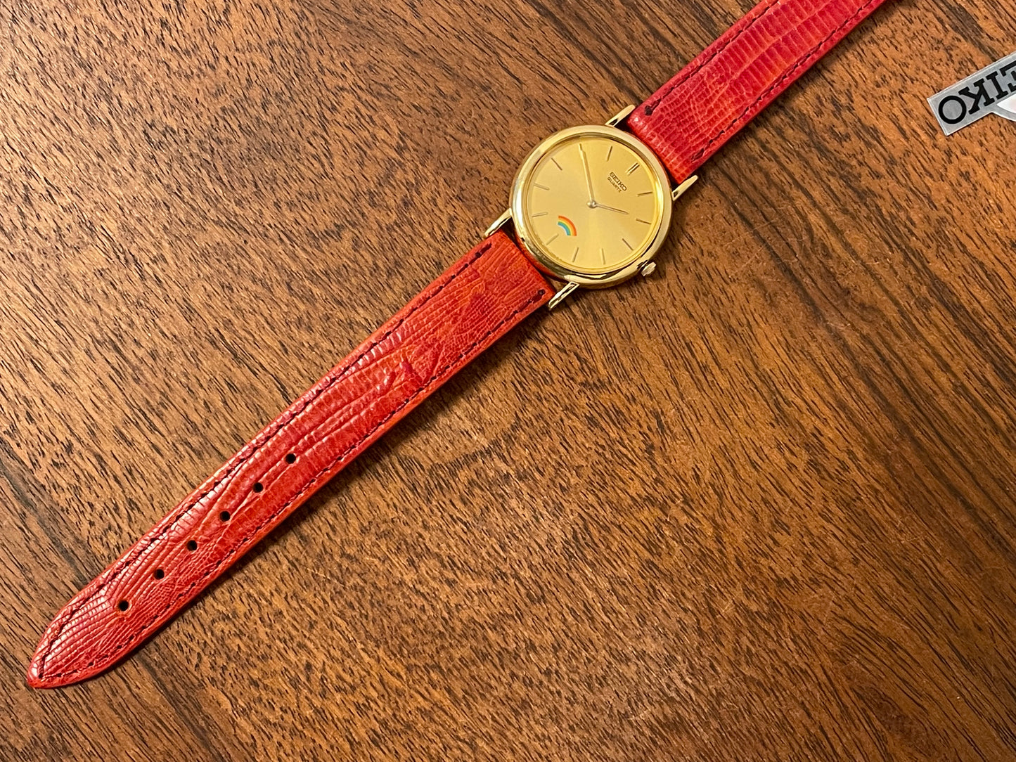 (2002) Seiko 4N00-0711 Quartz "Arcobaleno" dress watch - gold dial w/ rainbow logo - small size (NOS)