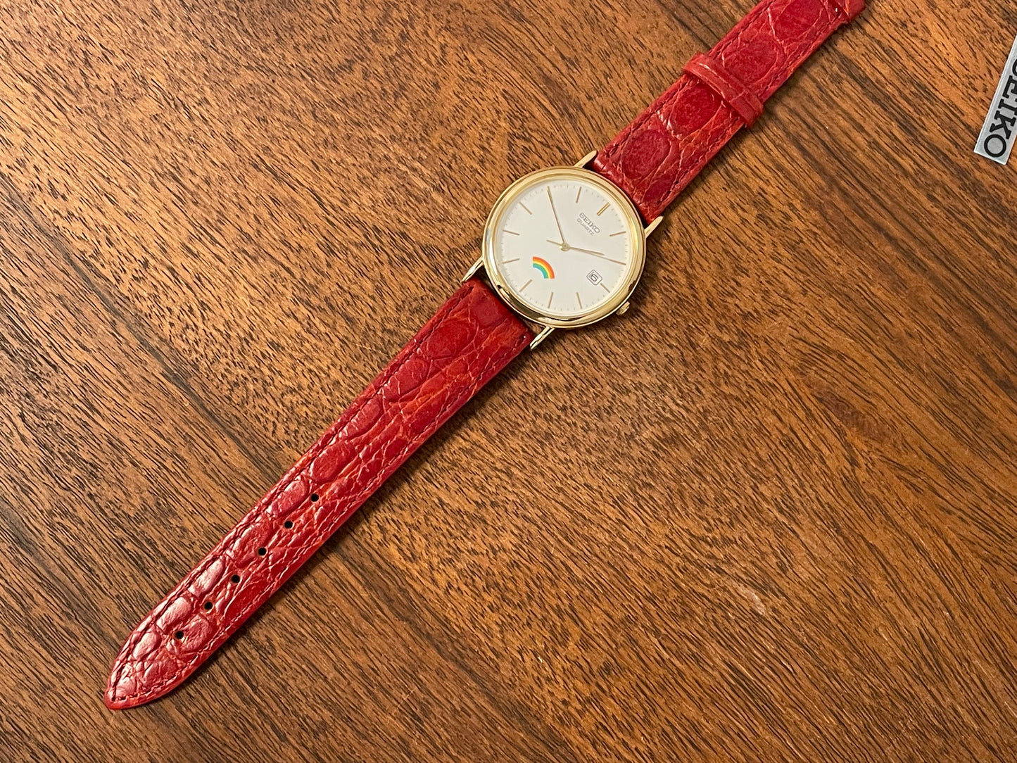 (2002) Seiko 7N22-8A00 Quartz "Arcobaleno" dress watch - white dial w/ rainbow logo (NOS)