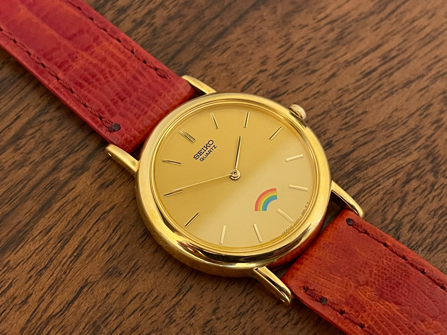 (2002) Seiko 4N00-0711 Quartz "Arcobaleno" dress watch - gold dial w/ rainbow logo - small size (NOS)