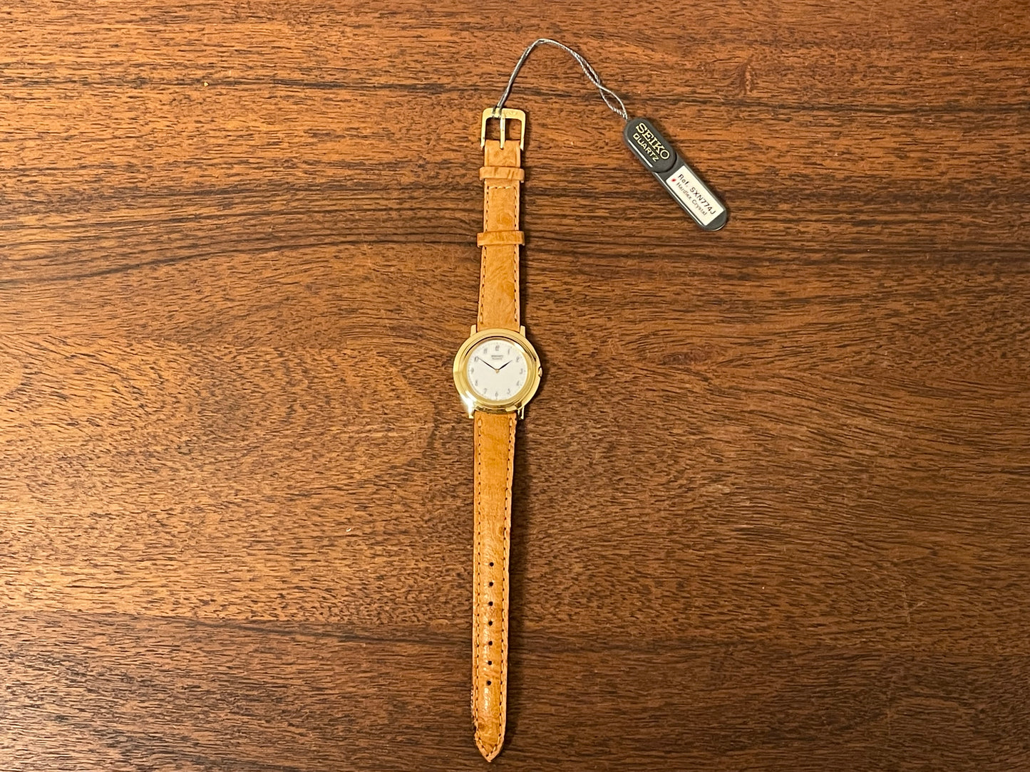 (1992) Seiko 4N00-0630 dress watch - white dial w/ Arabic numerals & leaf hands - small size (NOS)