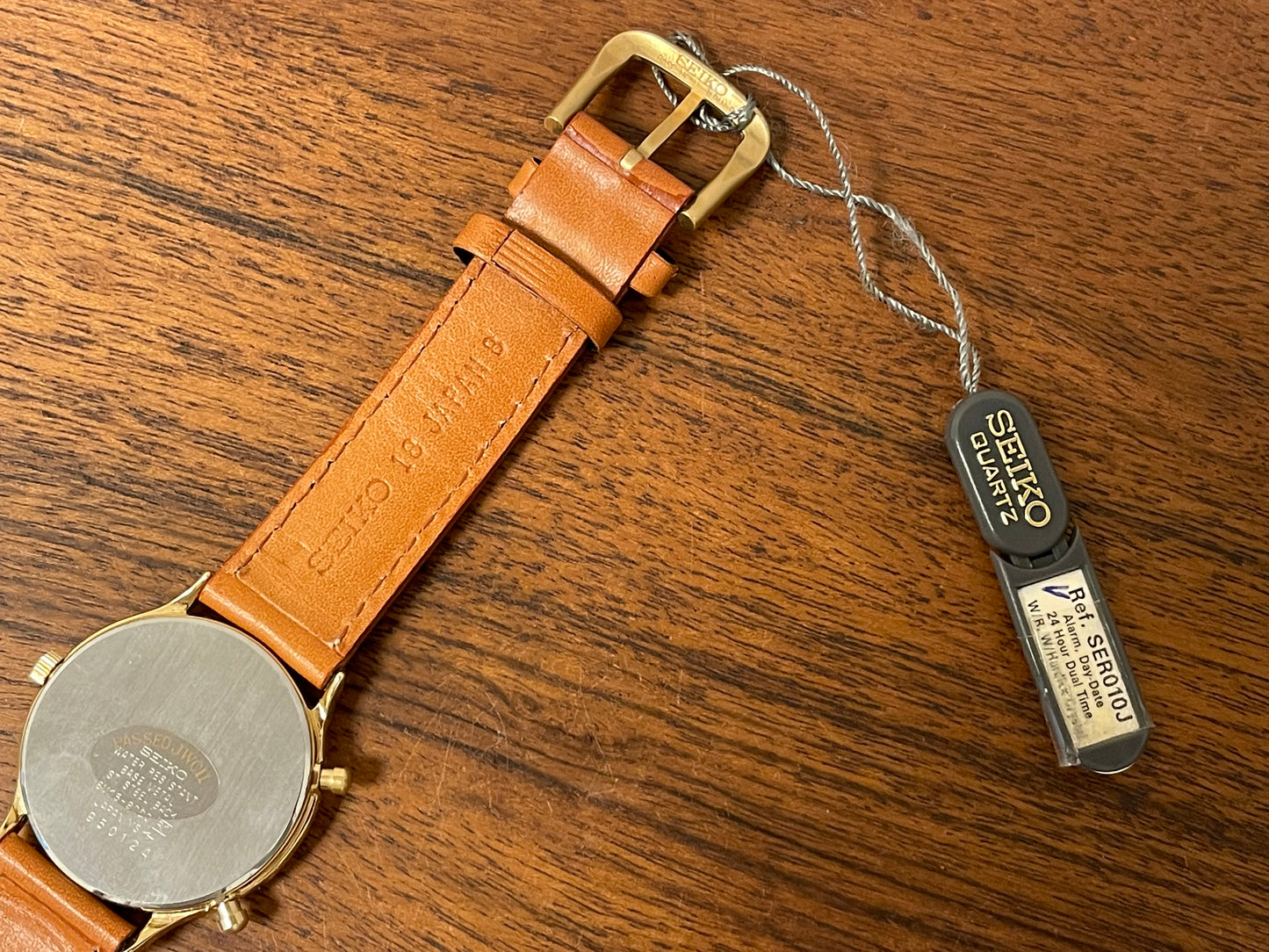 (1999) Seiko 8M15-9000 Quartz Alarm " dancing hands" - gold case w/ white dial (NOS)