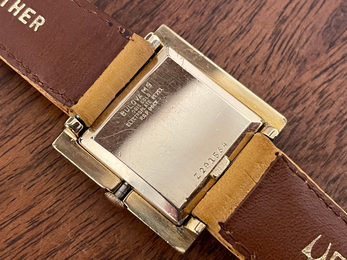 (1969) Bulova 62905-5Y President "G" M9 square dress watch - champagne dial with gold Roman numerals (serviced)