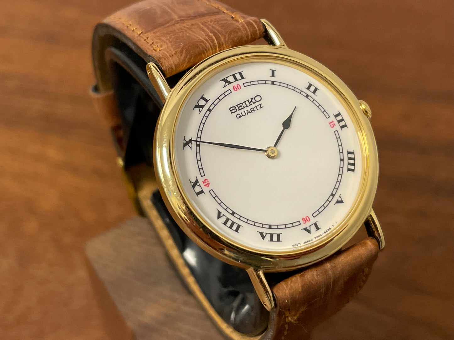 (1992) Seiko 7N00-6A00 dress watch - white dial w/ Roman numerals & Spade hands (NOS)