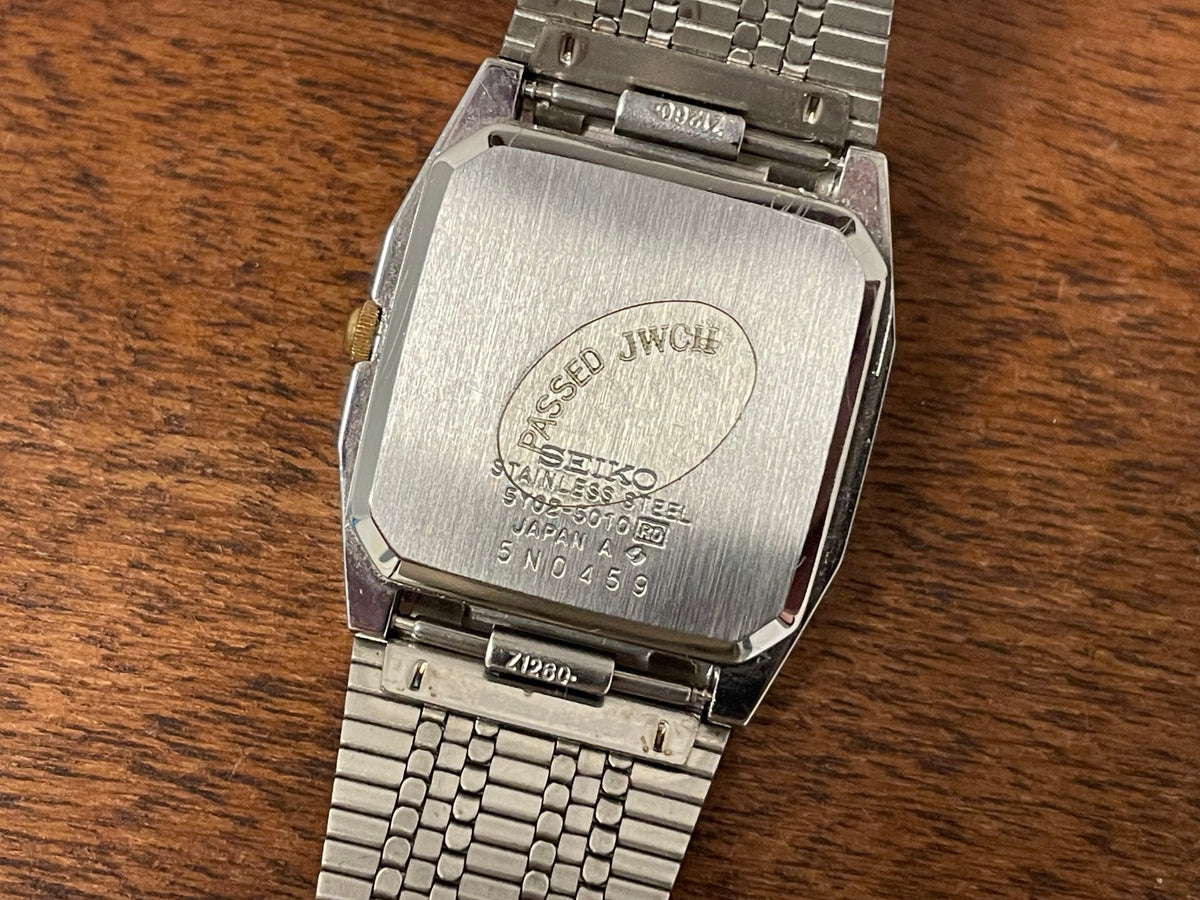(1985) 5Y02-5010 Seiko 5 quartz - integrated bracelet - silver brushed dial w/ stick markers (mint)