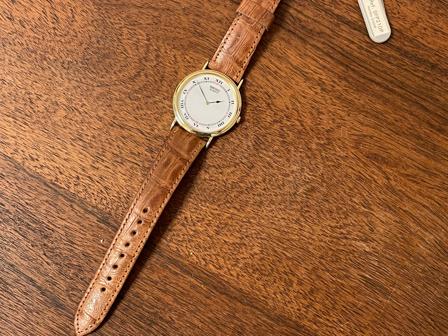 (1992) Seiko 7N00-6A00 dress watch - white dial w/ Roman numerals & Spade hands (NOS)