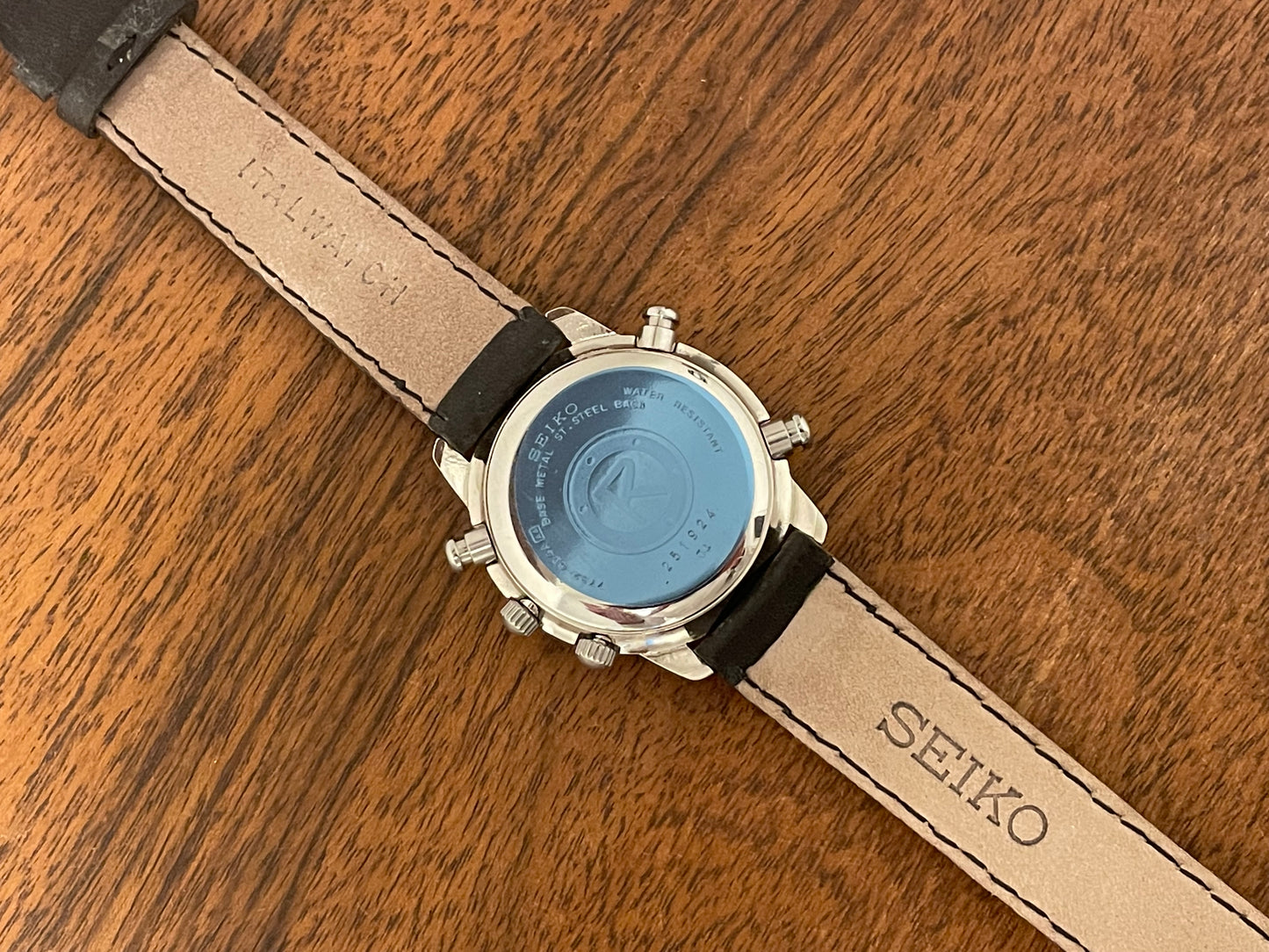 (1992) Seiko 7T32-6D4A Quartz big pusher chronograph - silver case - black dial w/ white Arabic numerals (NOS)