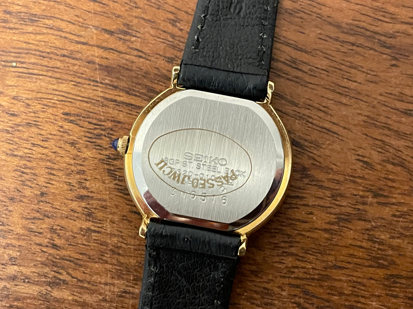 (1983) Seiko 7320-010A dress watch - purple bezel - dark blue dial w/gold markers - small size (NOS)