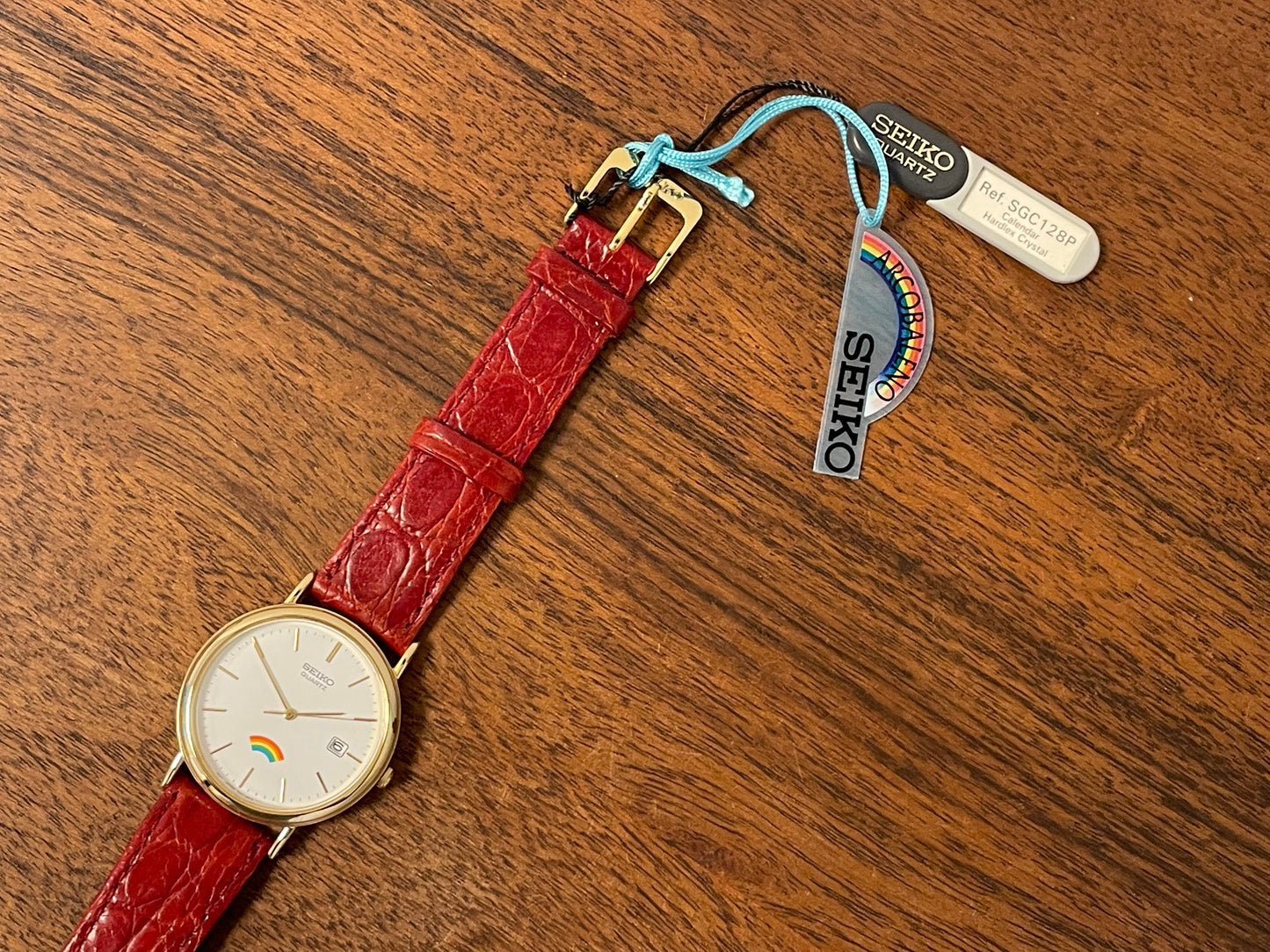 (2002) Seiko 7N22-8A00 Quartz "Arcobaleno" dress watch - white dial w/ rainbow logo (NOS)