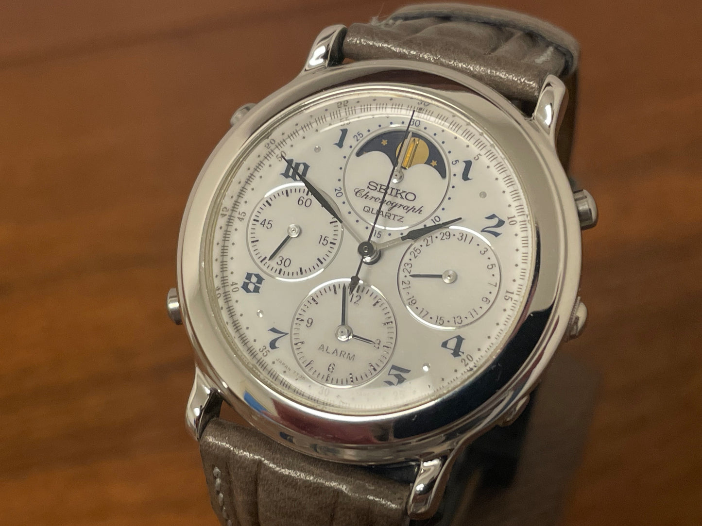 (1991) Seiko 7T36-7A00 chronograph, moon phase & alarm - silver case w/ white dial (NOS)