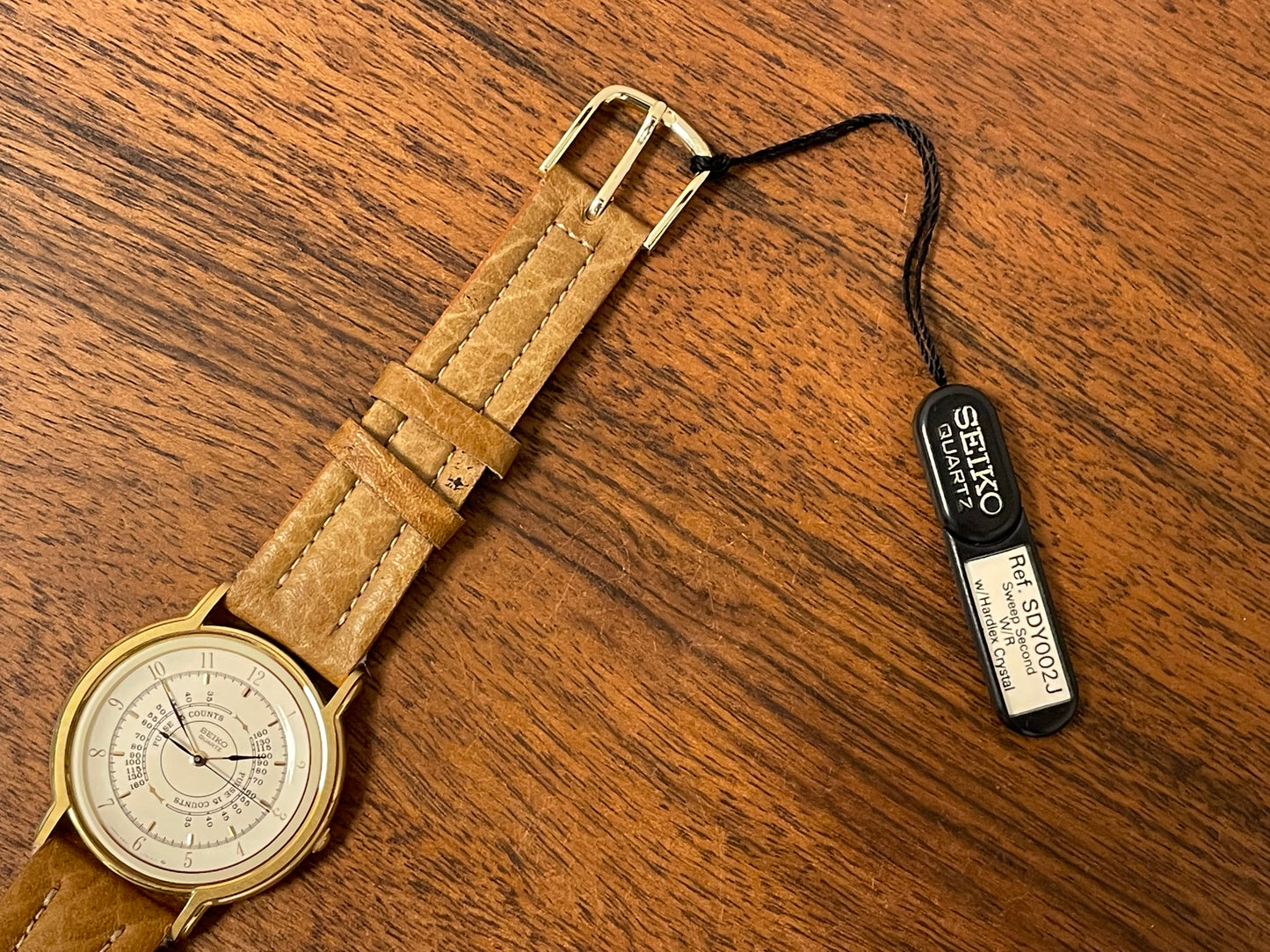 (1989) Seiko 5S21-7A10 Quartz medial pulsation - cream dial w/ gold Arabic numerals (NOS)