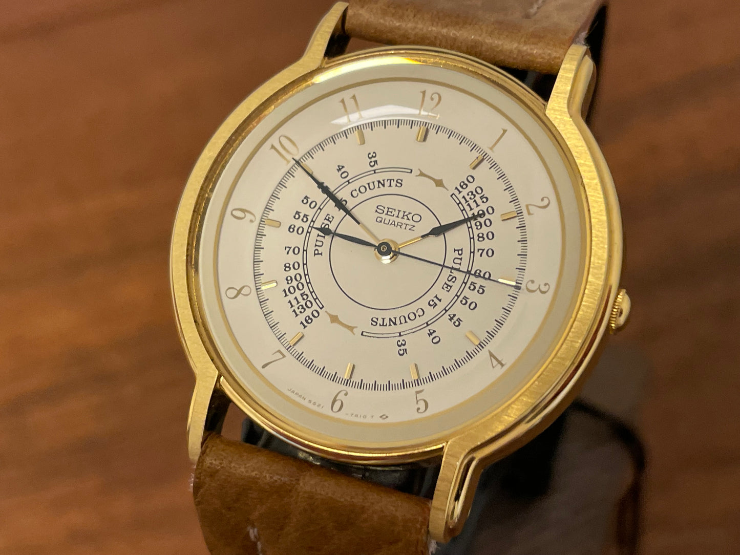 (1989) Seiko 5S21-7A10 Quartz medial pulsation - cream dial w/ gold Arabic numerals (NOS)