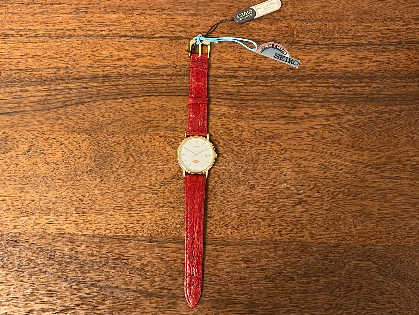 (2002) Seiko 7N22-8A00 Quartz "Arcobaleno" dress watch - white dial w/ rainbow logo (NOS)