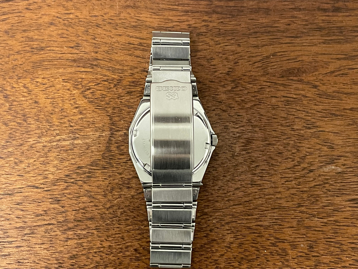(1984) Seiko 6923-7080 Quartz SQ 100 dodecagon bezel - white waffle dial